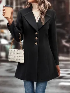 Macro view of black wool lapel coat showing buttons and textured fabric in detail