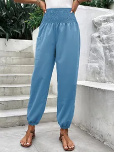 Pantalon de jogging taille haute élastique pour femme avec ceinture smokée et poche