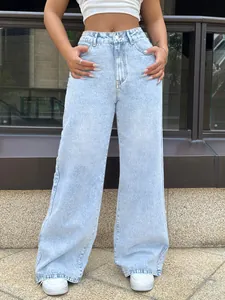 Front view detail of high-waisted light blue wide-leg denim jeans for women