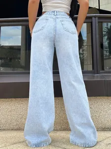 Detailed back view of high-waisted light-wash wide-leg denim jeans for street style