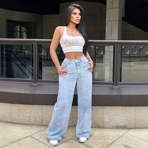 Stylish high waisted wide leg denim jeans with loose straight fit in light wash denim