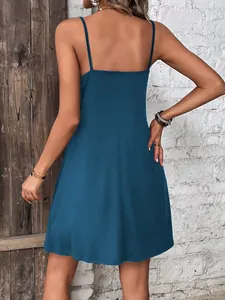 Back view of a casual solid teal camisole dress for women, sleeveless summer style.