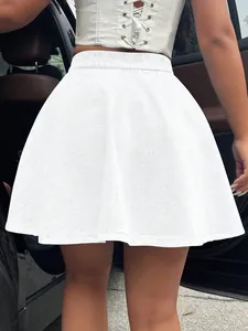 Detail back view of a stylish white high-waisted flared denim mini skirt for women