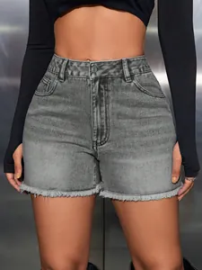 Detailed front view of high-waisted gray denim shorts with raw hem and straight leg fit