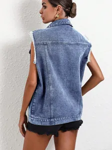 Rear view detail of vintage wash blue denim vest with stylish frayed armholes for women