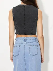 Vue arrière d'un gilet en jean noir court pour femme avec des coutures apparentes