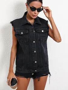 Detailed view of women's black denim vest with sleeveless design and metal buttons