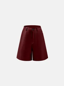 Burgundy high-waisted PU leather wide-leg shorts with a professional A-line silhouette