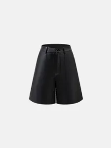 Detailed front view of high-waisted black PU leather A-line wide-leg shorts for women