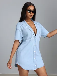 Model wearing a light blue lapel short-sleeved loose denim shirt dress with buttons