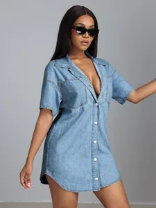 Detailed view of women lapel short sleeve denim shirt dress with white button-down front
