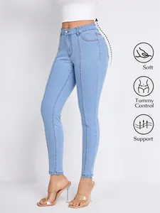 Close-up of light blue high-waist skinny jeans featuring tummy control functional icons