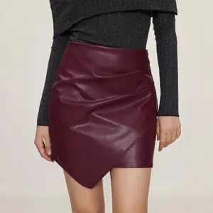 Burgundy asymmetrical PU leather mini skirt with pleated waist detail for women