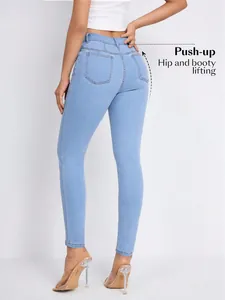 Close-up rear view of light blue high-waisted skinny jeans with push-up lifting effect