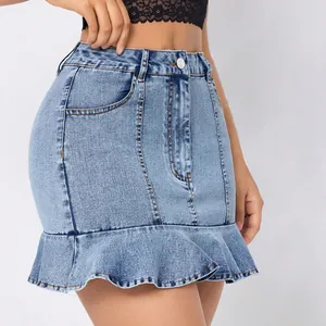 Stylish high waisted light blue denim mini skirt featuring a trendy ruffle hem design