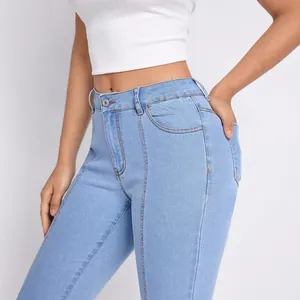 High-waisted slim-fit light blue jeans with vertical seam detailing for women