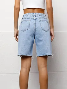 Back view detail of casual light wash high-waisted denim bermuda shorts with raw hem