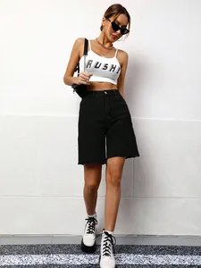 Trendy loose fit black washed denim Bermuda shorts for a casual street style look