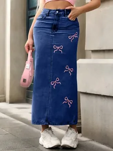 Chic long denim maxi skirt featuring pink bow embroidery and casual streetwear style detail
