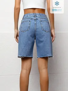 Back view of women's casual washed blue denim shorts with trendy raw hem detail.