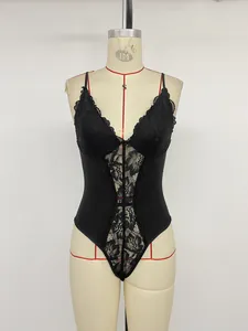 Detailed view of black lace patchwork V-neck bodysuit on a tailor mannequin display