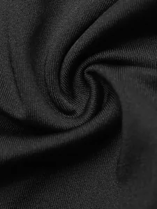 Detailed macro view showing the breathable black knit fabric texture of the bodysuit