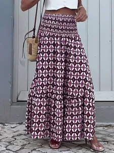 Gonna lunga boho con vita elasticizzata e stampa geometrica viola balza al fondo