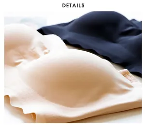 Close-up detail of seamless strapless bras with scalloped edges and soft texture