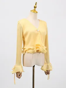 Elegant yellow pleated V-neck shirt with ruffled hem and flared sleeves for women