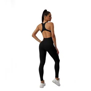 Back view of a black seamless yoga jumpsuit featuring a stylish open back design for fitness
