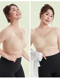 Seamless plus size beige bra with lace trim and high waist black leggings for women