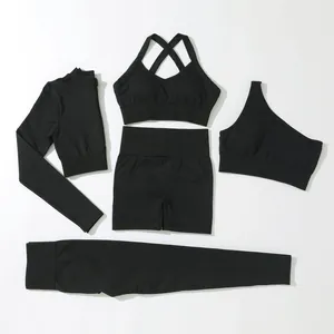 Set yoga senza cuciture nero da 5 pezzi comprensivo di reggiseni, top e leggings.