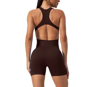 Back view of a seamless brown yoga bodysuit with an open back and ribbed texture.