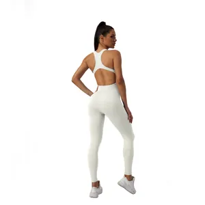 Back view of professional white seamless one-piece yoga jumpsuit with open back design
