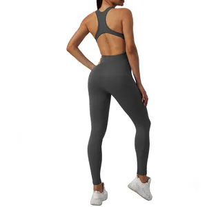 Rear view of grey seamless yoga jumpsuit featuring a stylish backless cutout design