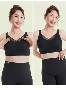 Detail view of black seamless plus-size lifting bra with lace trim and high-waist leggings.