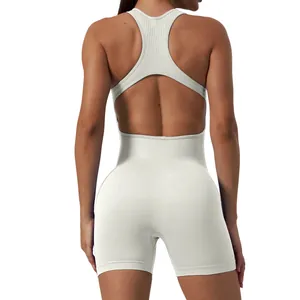 Close-up back view of a white seamless one-piece yoga romper with a cutout design