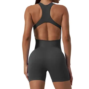 Back view of seamless one-piece yoga romper with cutout design and ribbed texture