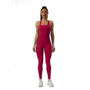 Full-length seamless yoga jumpsuit in vibrant magenta with a sleek open back design