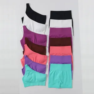 Completi yoga senza cuciture con reggiseni monospalla e pantaloncini a vita alta