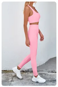 Side view detail of a pink seamless yoga set featuring a sports bra and high-waist leggings.