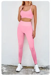 Stylish pink seamless yoga set with sports bra and high waisted leggings for fitness