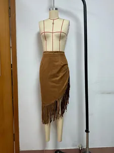 Detail of brown suede midi skirt with Western fringe hem on a professional mannequin.
