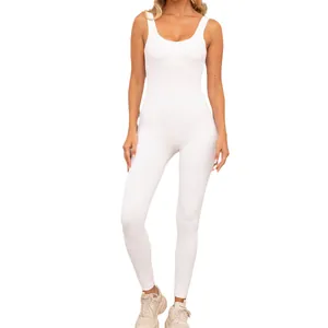 Elegant white seamless ribbed one-piece yoga jumpsuit unitard for fitness and gym workouts.