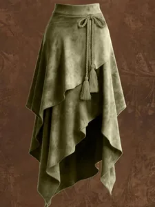 Detailansicht eines Vintage-Wildleder-Midirocks mit unregelmäßigem Saum und Quast.