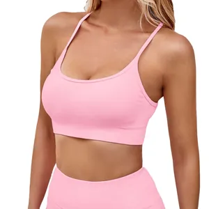 Seamless pink yoga set with sports bra and high-waisted lifting shorts for fitness