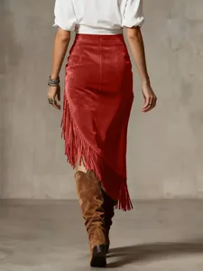 Red suede skirt with asymmetric fringe detail in retro western style shown from back.
