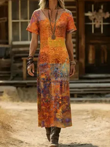 Abito lungo vintage in stampa bohémien con scollo a V e maniche corte per l'estate.