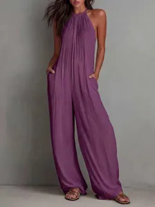 Elegant purple pleated halter neck wide-leg jumpsuit featuring side pockets for women.