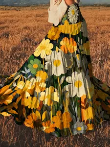 Gedetailleerd overzicht van elegante boheemse bloemenprint op een romantische maxirok.